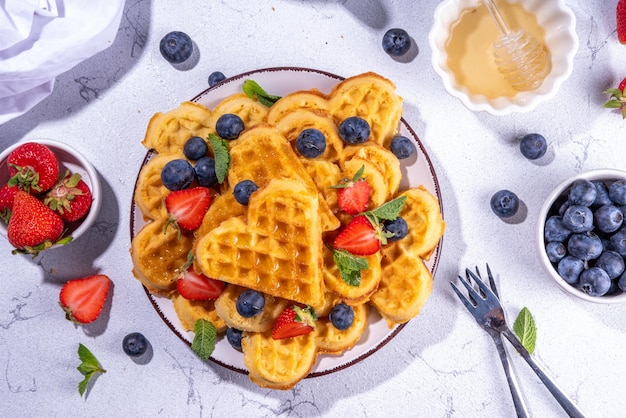 Breakfast belgian waffles with berry