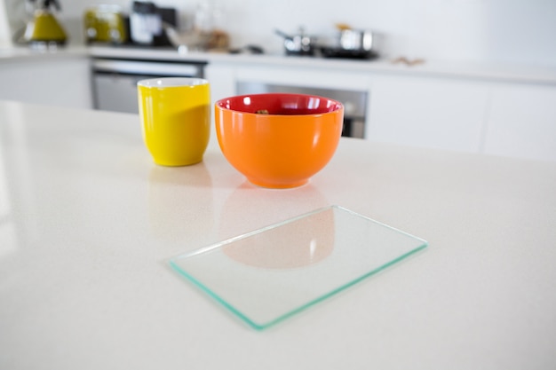 Breakfast bowl with coffee mug in kitchen