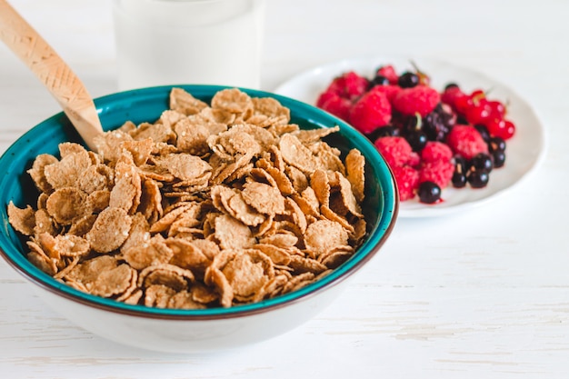 Breakfast cereal with milk on a white background