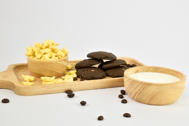 Breakfast includes milk, chocolate cookies And Honey Star Cereal Coffee 