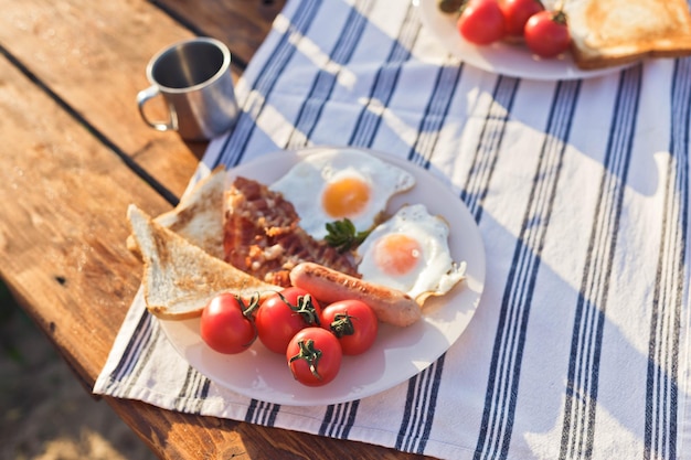 Breakfast near the travel trailer Breakfast in nature