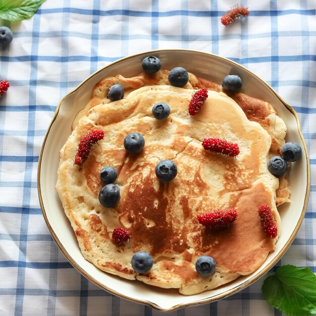 Photo breakfast  pancakes with blueberries