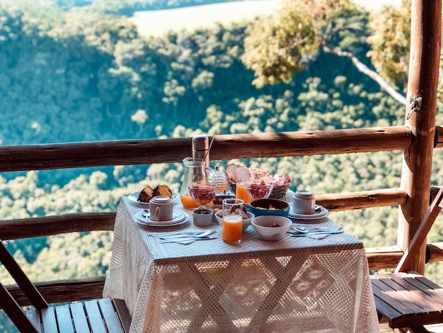 Breakfast in a rustic hotel overlooking the nature