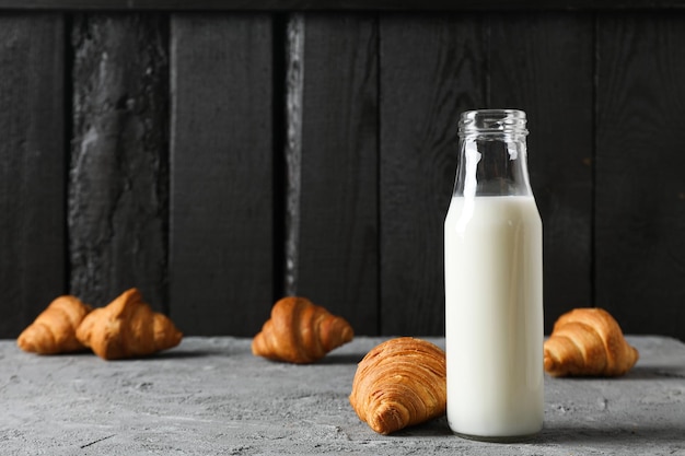 Breakfast tasty food concept - milk with bakery products