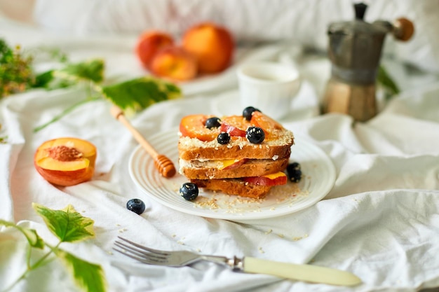 Breakfast on white bed sheets good morning summer french toast