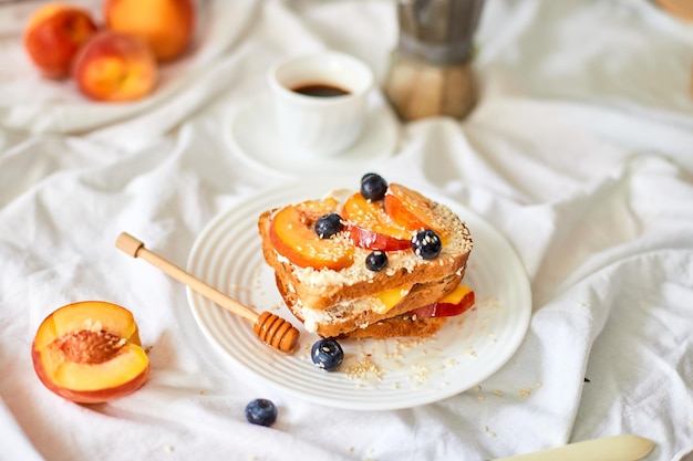 Breakfast on white bed sheets good morning summer french toast