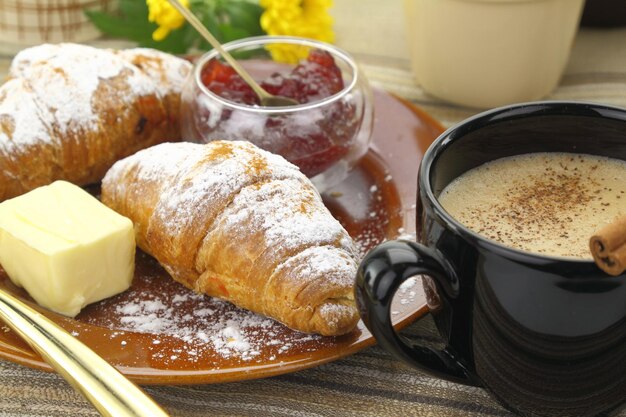 Breakfast with croissants and coffee