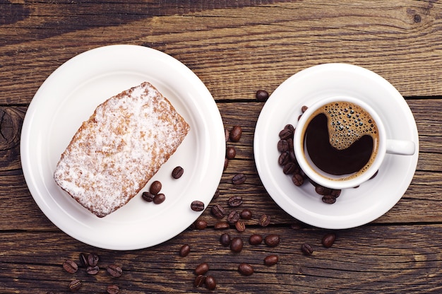 Breakfast with cupcake and coffee. Top view