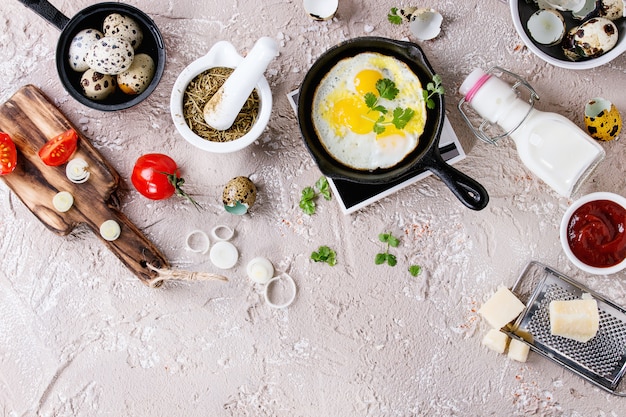 Breakfast with fried quail eggs