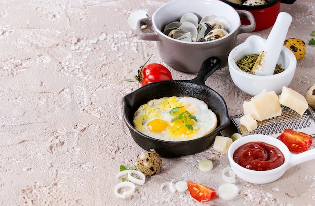 Breakfast with fried quail eggs