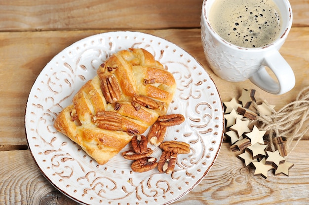 Breakfast with pecan cake and coffee