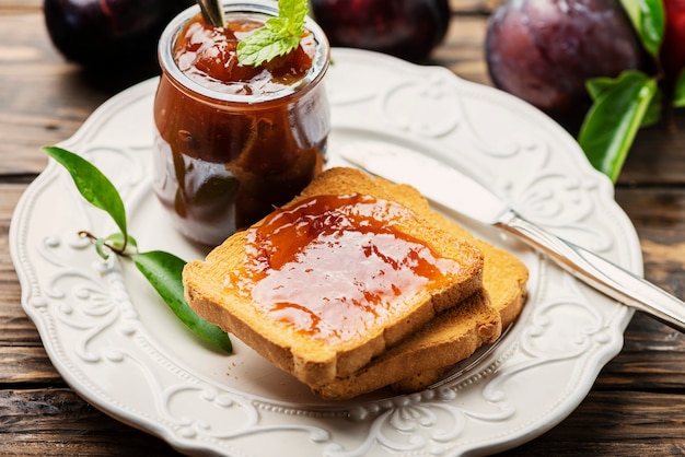 Breakfast with toast and plum jam