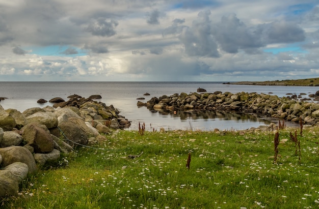 Breakwater, ocean and sky at Lista in southern Norway