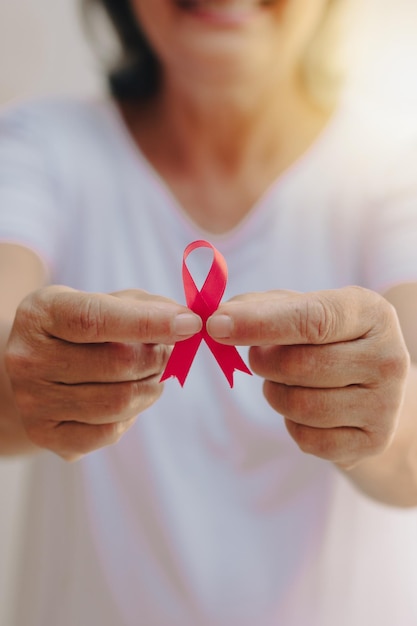 Breast Cancer Awareness Month image Mature White Woman With pink ribbon isolated