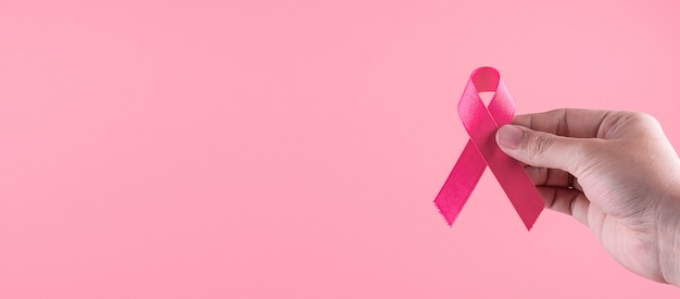 Breast Cancer Awareness month, Pink Ribbon supporting people living and illness. Healthcare, International Women day and World cancer day concept