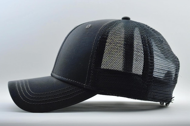 Photo breathtaking featuring black trucker hat mockup on white background side view the cap is solid bla