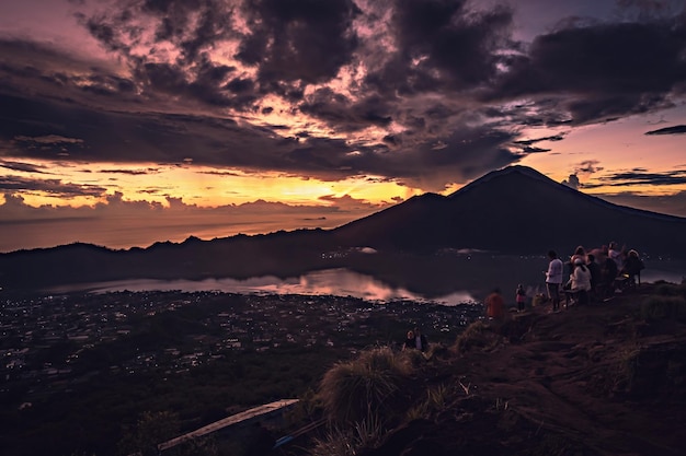 Breathtaking sunrise over Abang mountain, view from Batur volcano and Batur lake, Bali, Indonesia