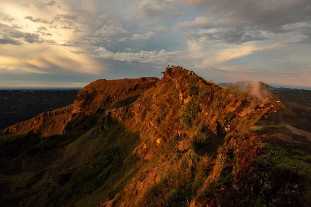 Breathtaking sunrise over Abang mountain, view from Batur volcano and Batur lake, Bali, Indonesia