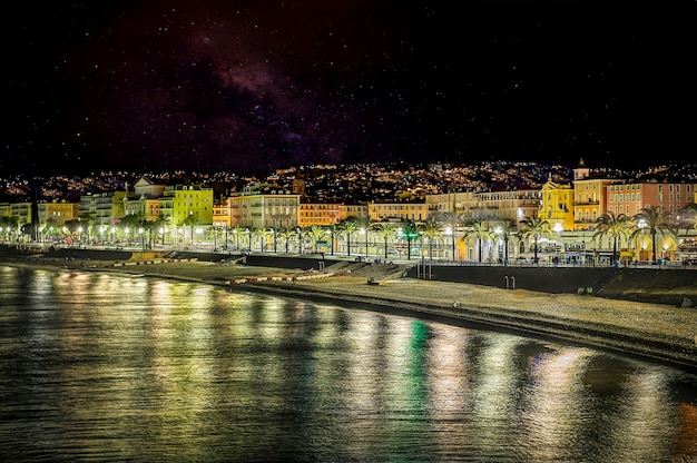 Breathtaking view of Nice Beach at the promenade, in night vision.