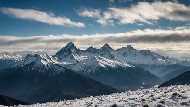 A breathtaking vista of snowcapped peaks stretching as far as the eye can see with wispy clouds ge