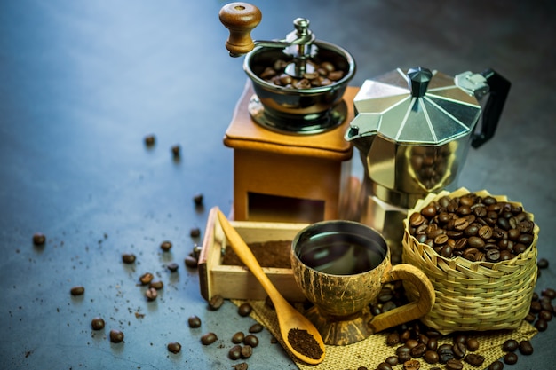 Brew black coffee in coconut cup and morning lighting. 