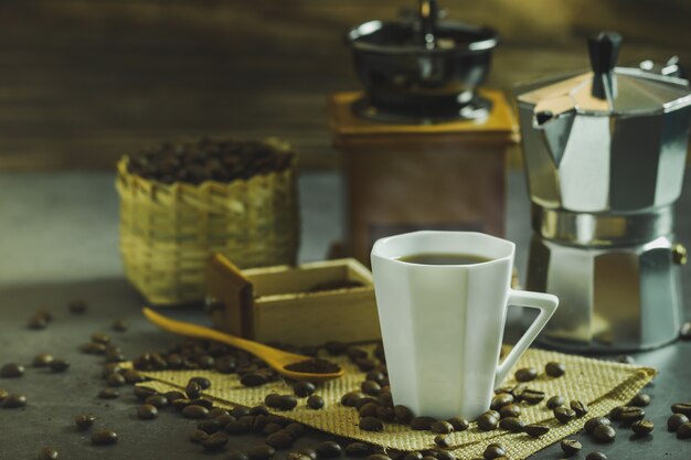 Brew black coffee in a white cup and morning lighting. 