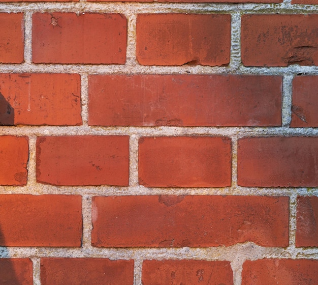 Brick backgrounds A closeup photo of a wall of red bricks