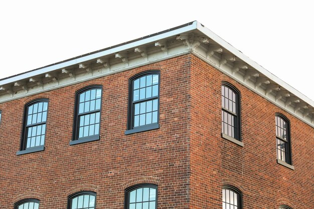 Photo brick building with arched windows symbolizing stability and growth in the business and mortgage in