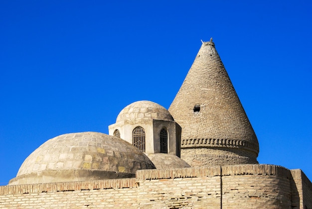 Brick facade of an ancient mausoleum in Bukhara