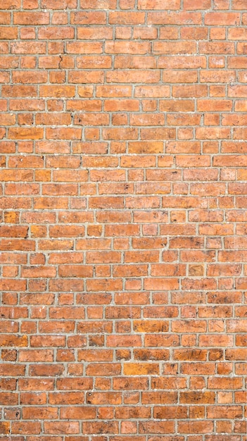 Brick wall background vertical photo of a brick wall