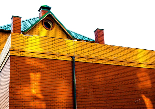 A brick wall illuminated by the sun.