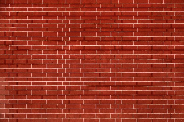 Brick wall is bright red texture of stone blocks background of bricks Horizontal image