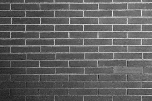 A brick wall with a white sign that says'i'm not a girl '