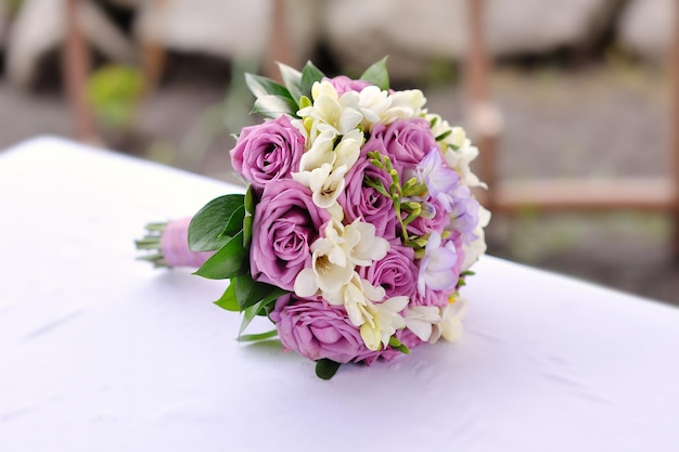 Bridal bouquet of purple roses