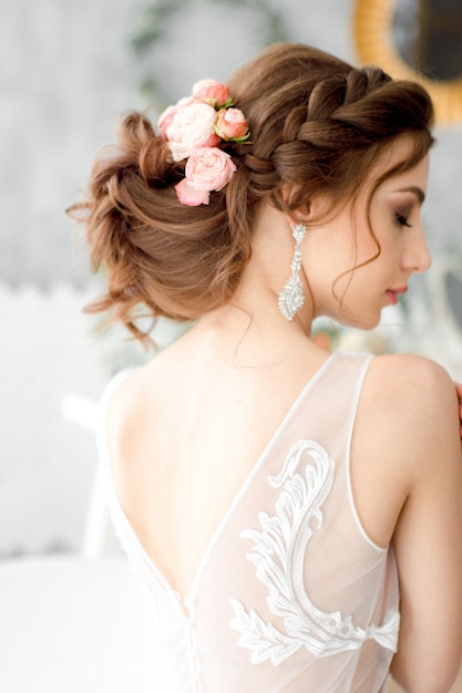 Bridal hairstyle with fresh flowers