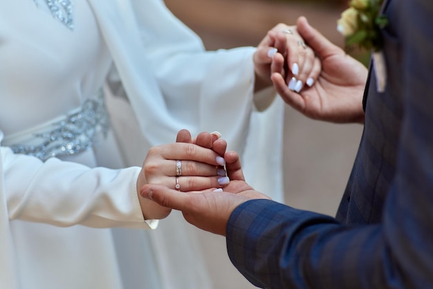 Bride and groom Asian Muslims marry in a beautiful red love theme celebration nikah day