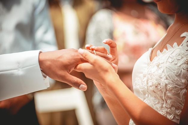 Bride and groom getting married in an outdoor ceremony