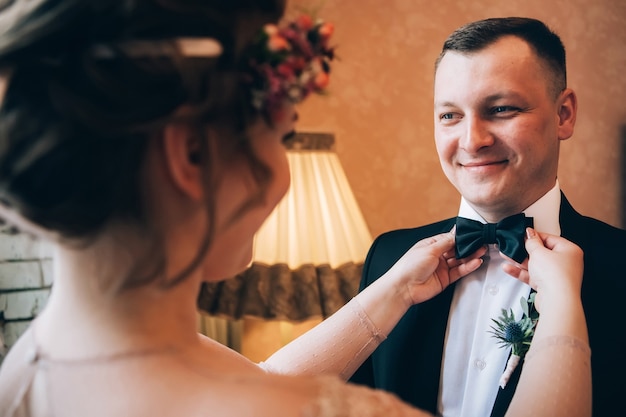 Bride and groom hugging on wedding day