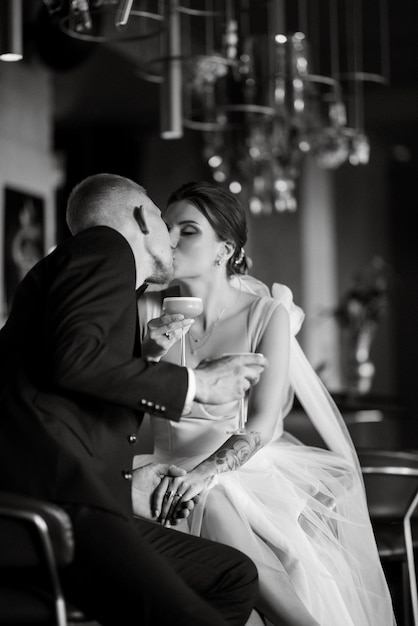 Bride and groom inside a cocktail bar