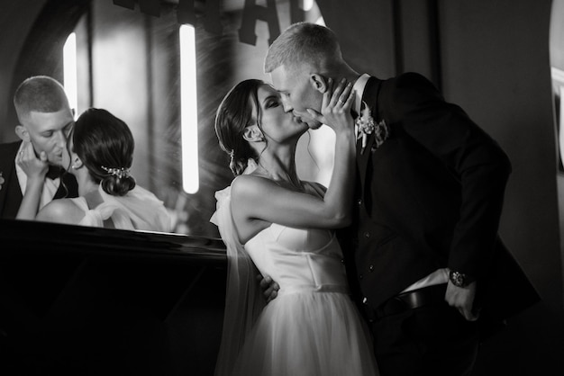 Bride and groom inside a cocktail bar