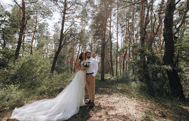 Bride and groom Luxurious young couple of newlyweds in love posing for the first family wedding photo shoot