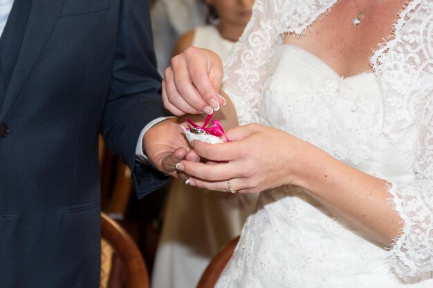 bride and the groom showing their rings