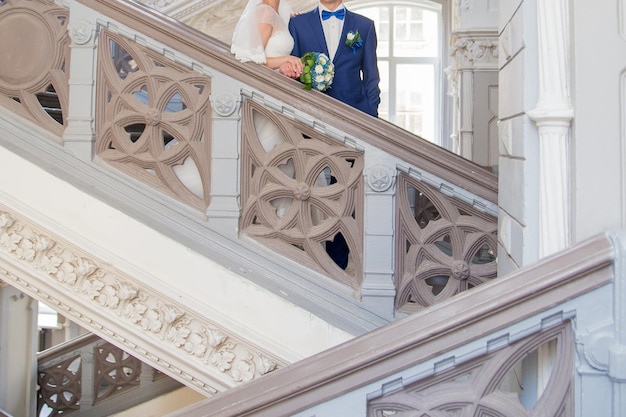 Bride and groom together in a building