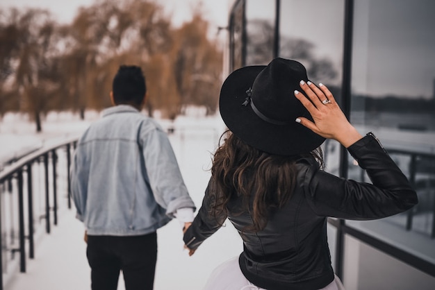 bride and groom walking in winter