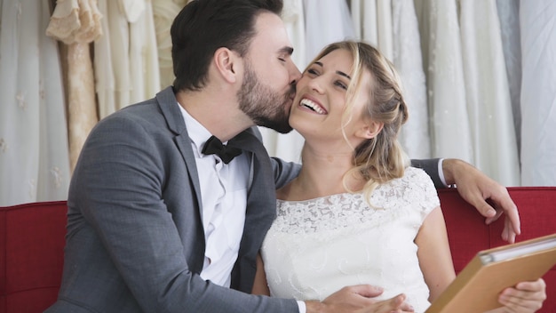 Bride and groom in wedding dress prepare ceremony.