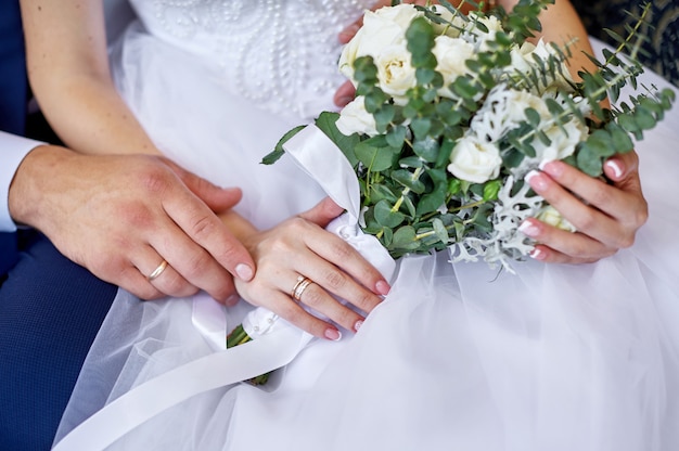 bride holding flower bouquet