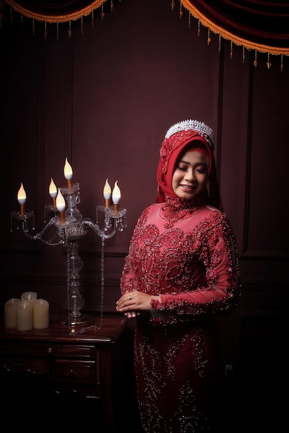 Bride model using Muslim customs in a photo studio