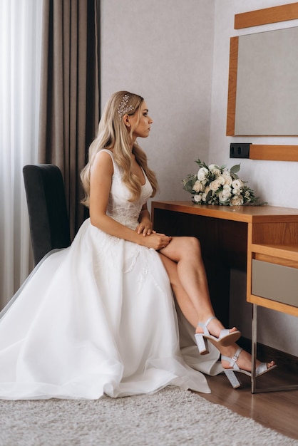 Bride sitting in a hotel room