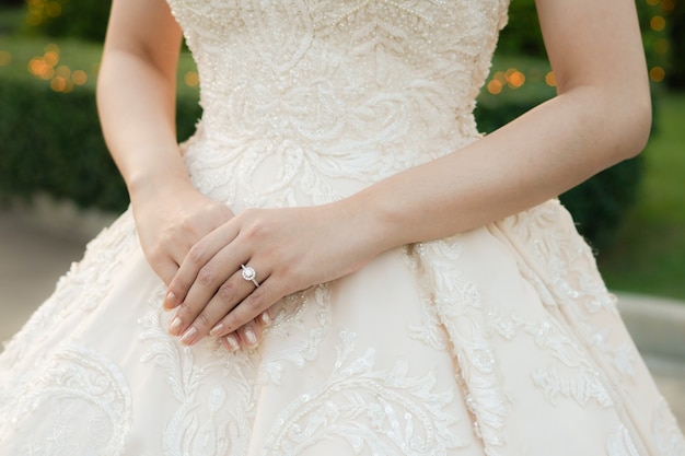 Bride standing and hand pose with wedding ring. wedding and beauty concept.