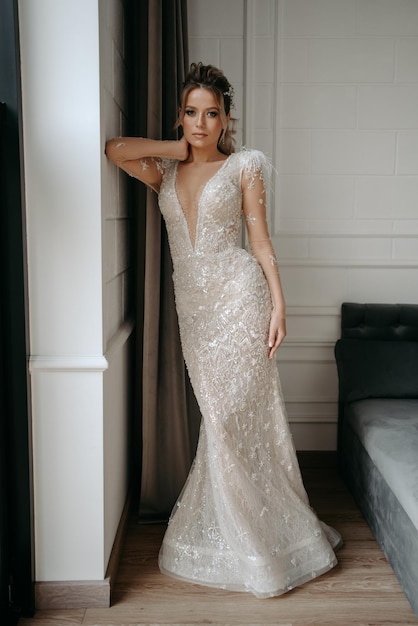 Bride in a wedding dress with a lace bodice and a long train